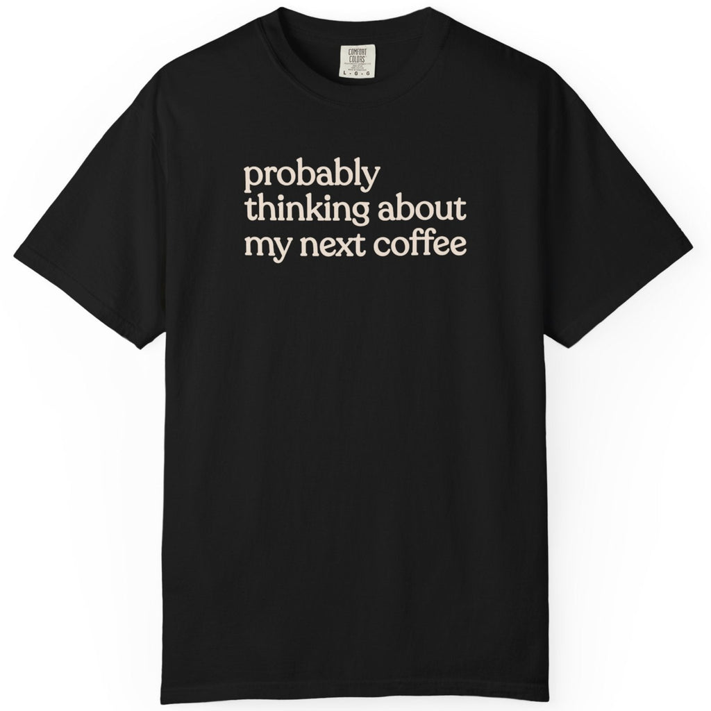 Probably thinking about my next coffee T-shirt
