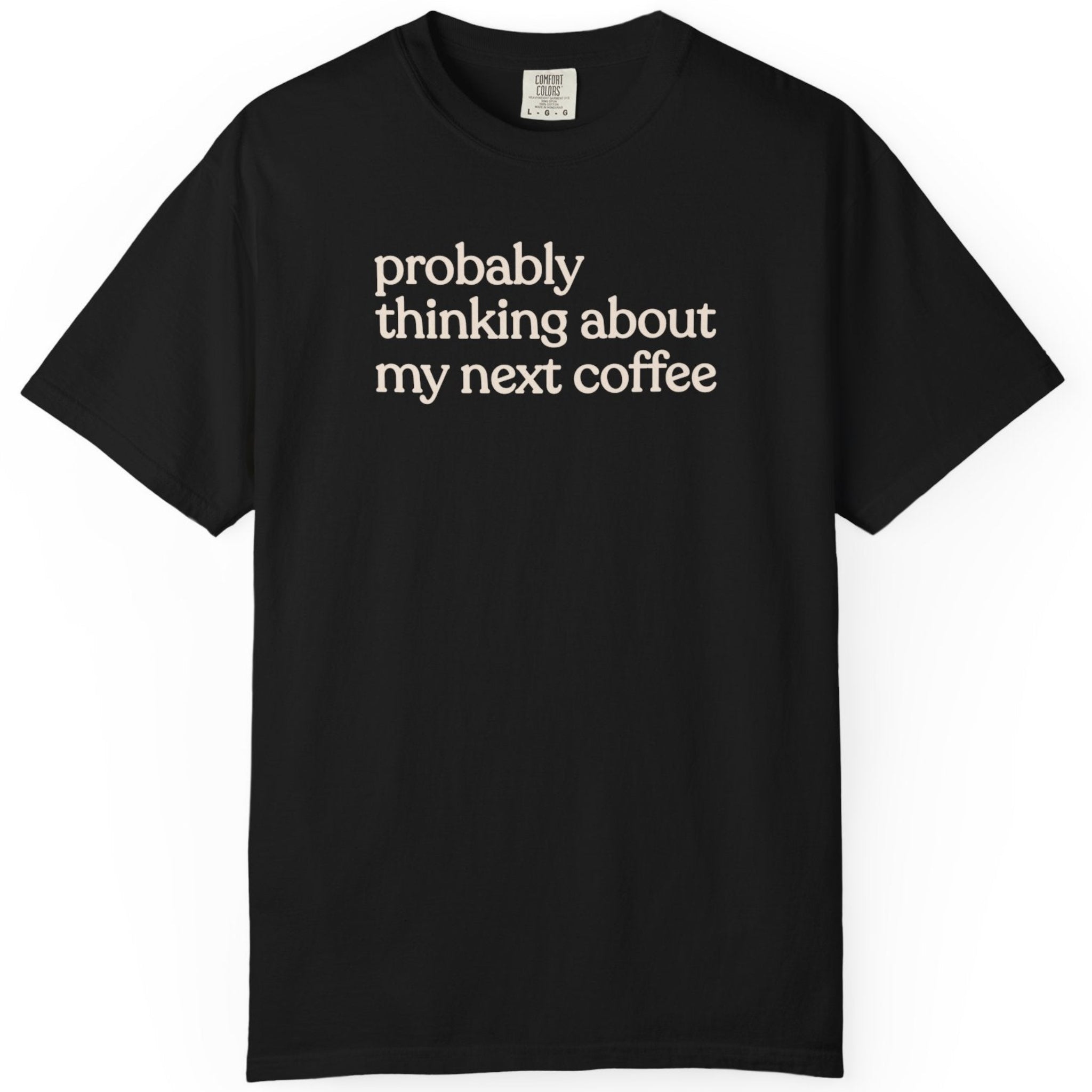Probably thinking about my next coffee T-shirt