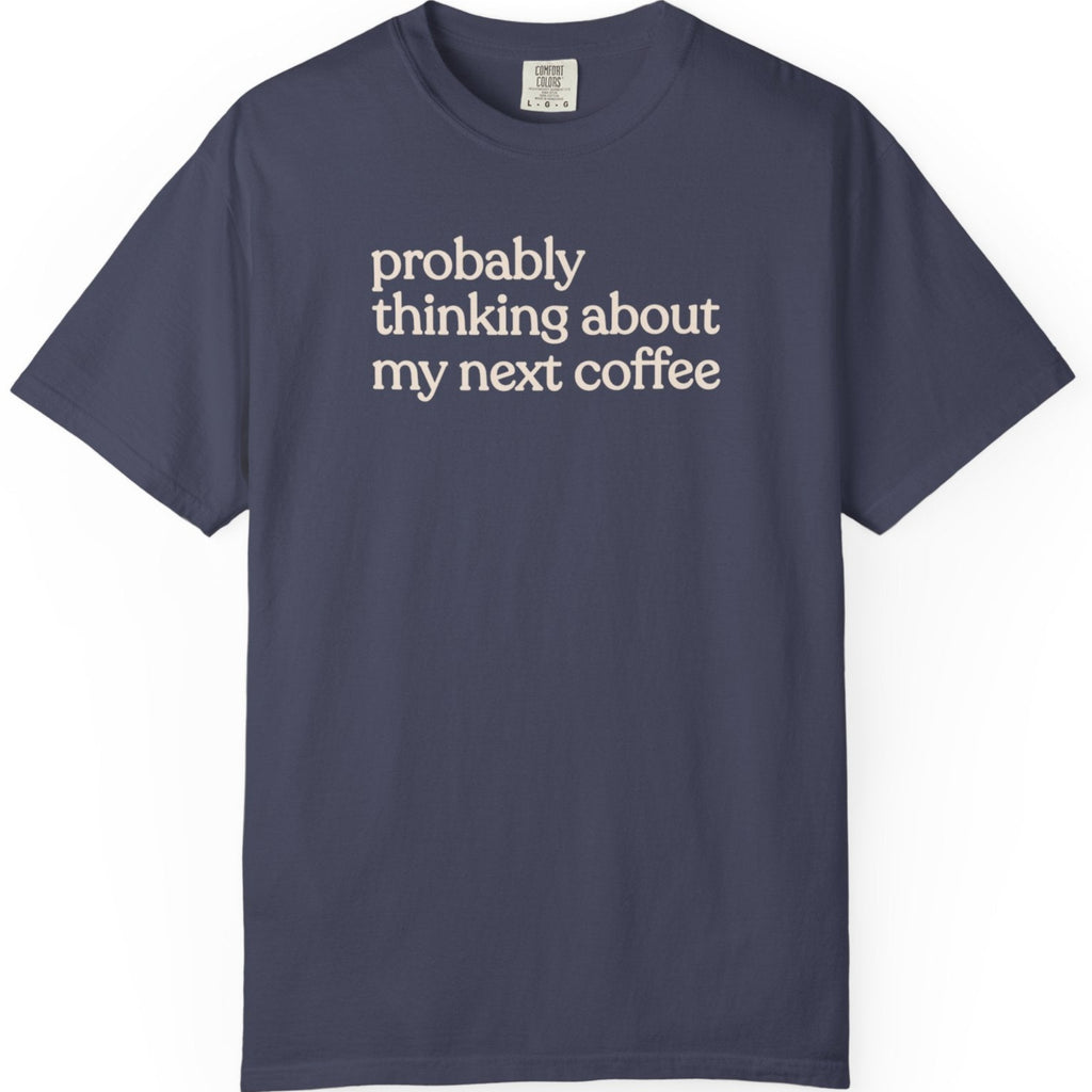 Probably thinking about my next coffee T-shirt