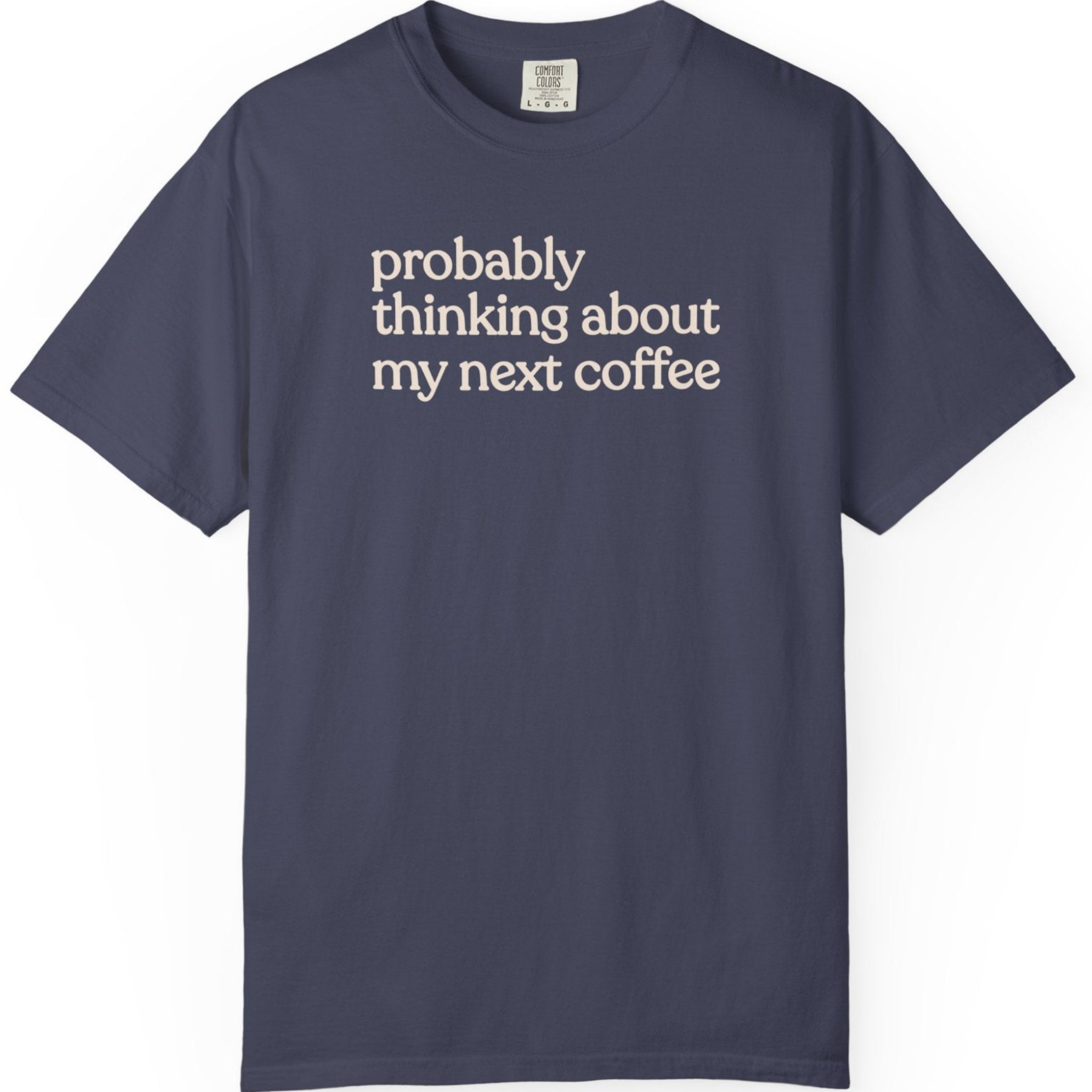 Probably thinking about my next coffee T-shirt