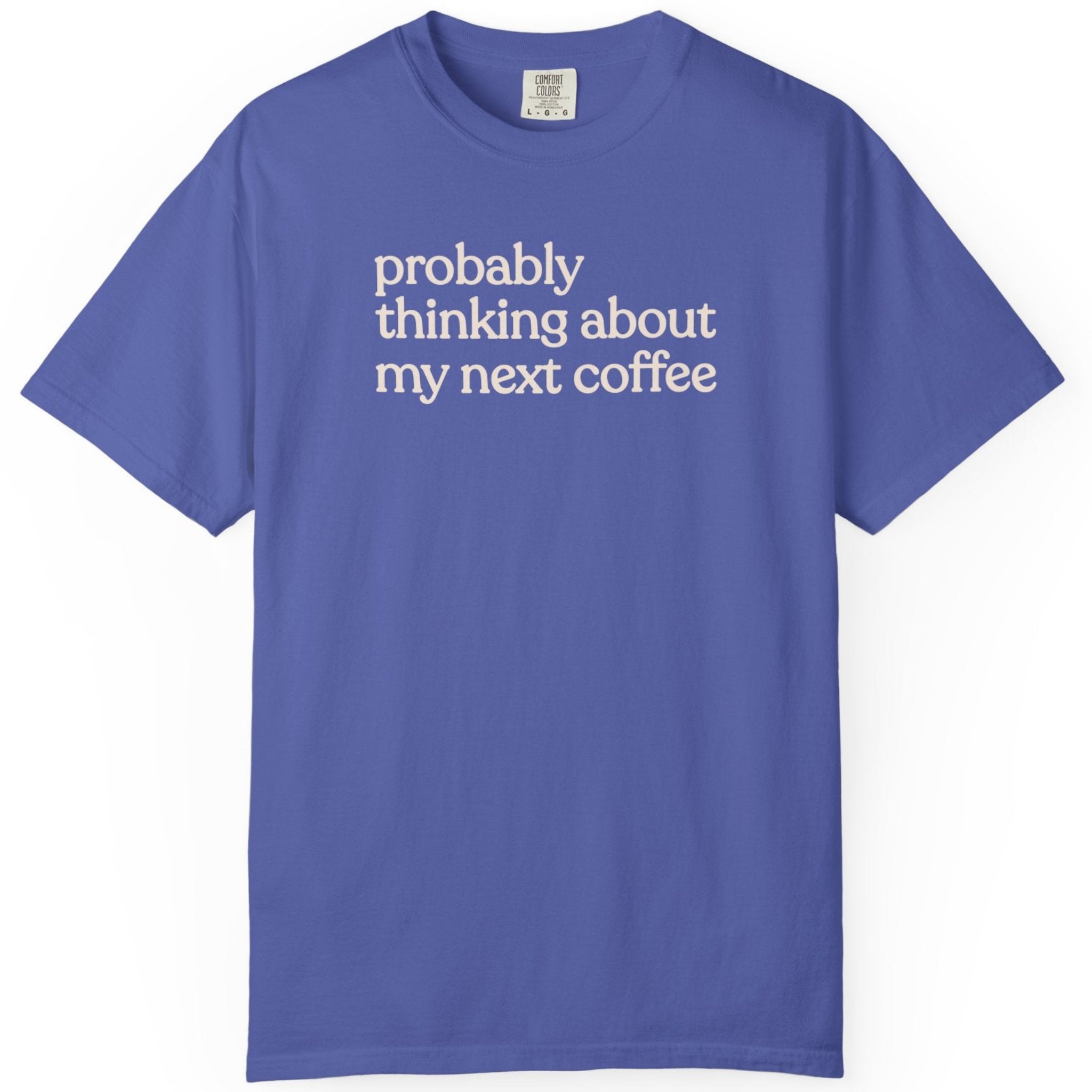 Probably thinking about my next coffee T-shirt
